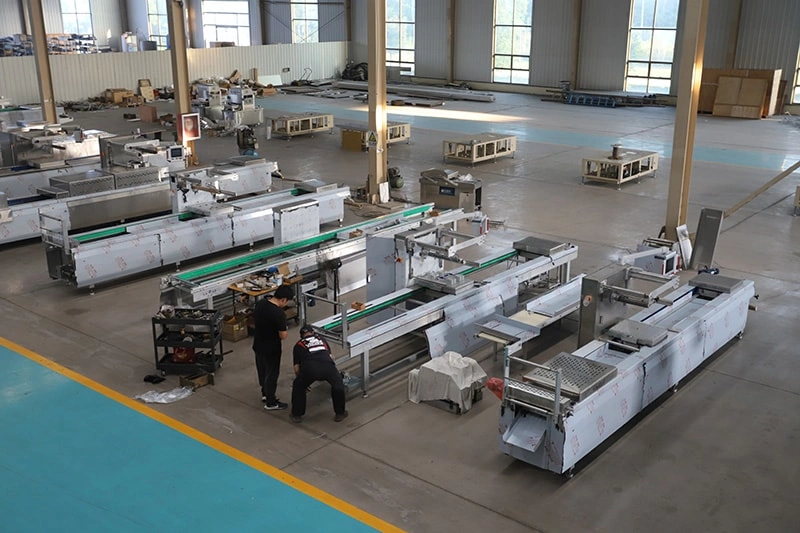 In recent years, the demand for Rolling Vacuum Packaging Machine solutions has continued to grow rapidly across the global food processing industry. More overseas buyers are now turning to source manufacturers instead of trading companies, hoping to achieve better pricing, stable machine quality, and long-term technical support. As a professional manufacturer specializing in vacuum packaging equipment, Songri Machinery has focused on the research, development, and production of vacuum packaging machines for more than 30 years, earning the trust of customers from many countries and regions.  As a long-established enterprise in the packaging machinery industry, Songri Machinery continues to improve the performance and efficiency of its Rolling Vacuum Packaging Machine products. These machines are widely used for meat, seafood, pickled food, agricultural products, and frozen food packaging. With stable vacuum performance, continuous operation capability, and durable stainless steel structure, the equipment helps customers improve packaging efficiency while extending product shelf life. Backed by a professional production team and mature manufacturing system, Songri Machinery provides reliable vacuum packaging solutions for factories of different sizes.  Today, more international customers prefer cooperating directly with experienced manufacturers like Songri Machinery when purchasing a Rolling Vacuum Packaging Machine. With over three decades of industry experience, the company not only offers professional equipment manufacturing, but also provides overseas shipment support, installation guidance, and comprehensive after-sales service. As a trusted source factory specializing in vacuum packaging machinery, Songri Machinery continues to strengthen its global reputation through stable quality, efficient production, and long-term customer partnerships.